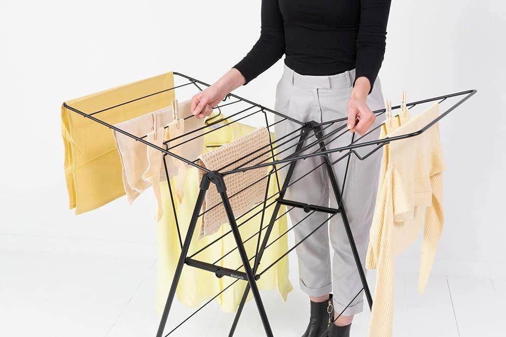image:imageBrabantia HangOn Compact Clothes Drying Rack 49ft 15m Matt Black Small Indoor Clothes Airer Laundry Stand with 2 FoldOut Wings amp Hanger Hooks Folds Flat Ideal for Condos Fits Full Load02 matte black 15M