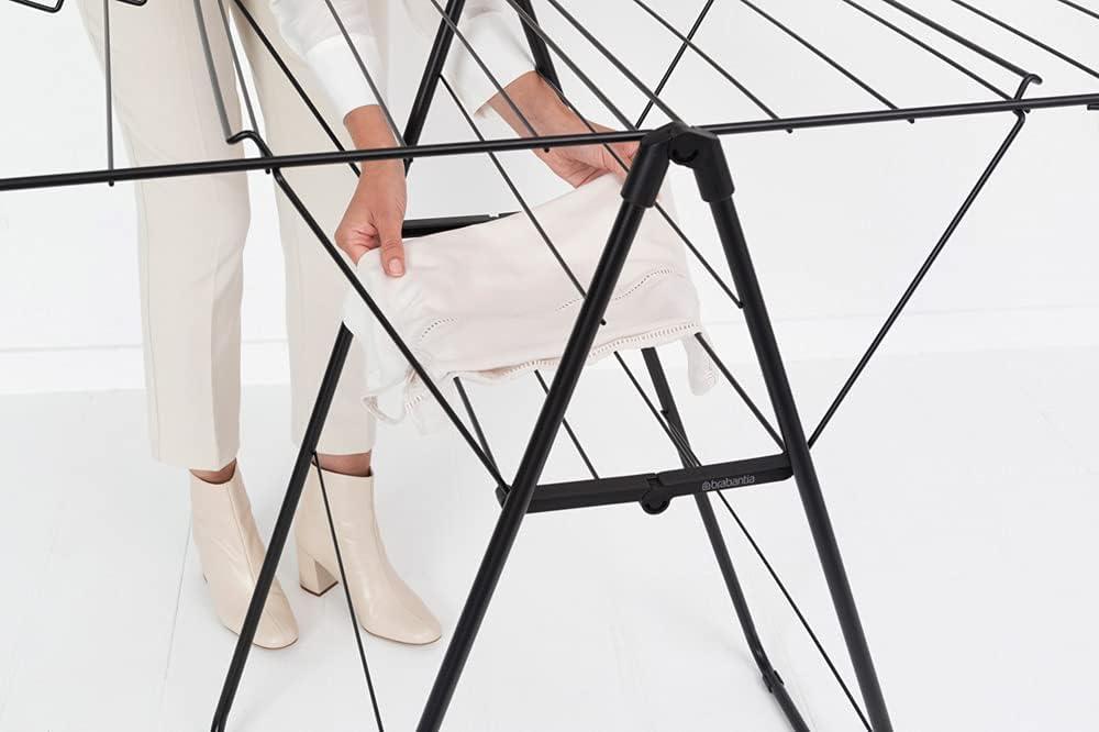 image:imageBrabantia HangOn Compact Clothes Drying Rack 49ft 15m Matt Black Small Indoor Clothes Airer Laundry Stand with 2 FoldOut Wings amp Hanger Hooks Folds Flat Ideal for Condos Fits Full Load02 matte black 15M